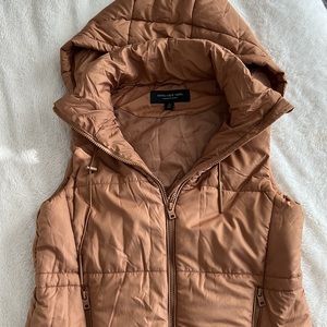 Long camel colored puffer vest with hood
